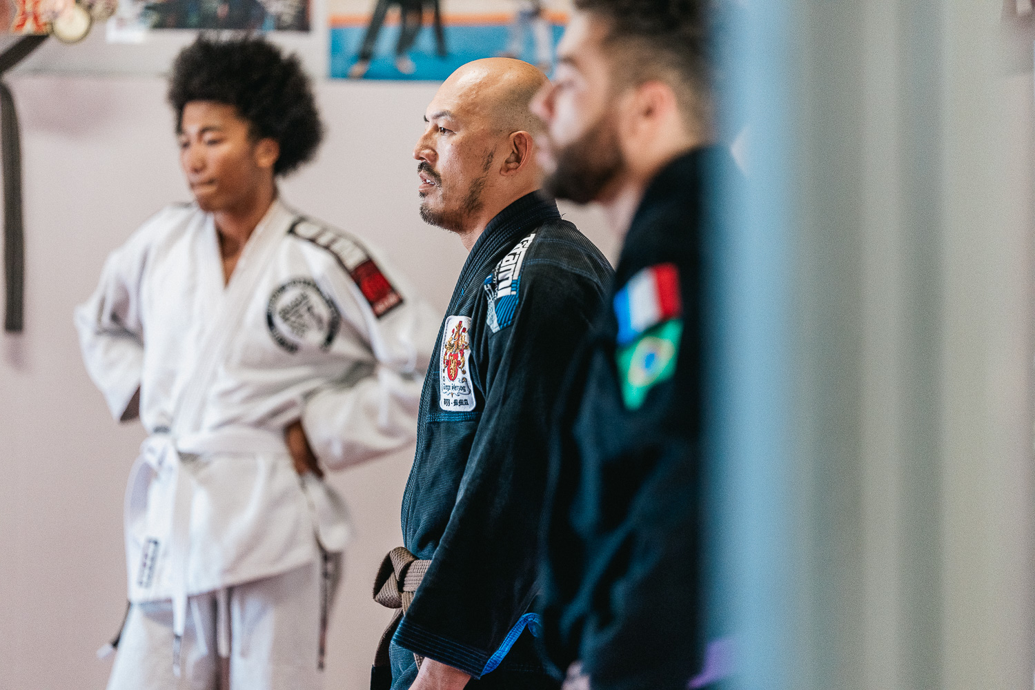 Students practicing BJJ techniques
