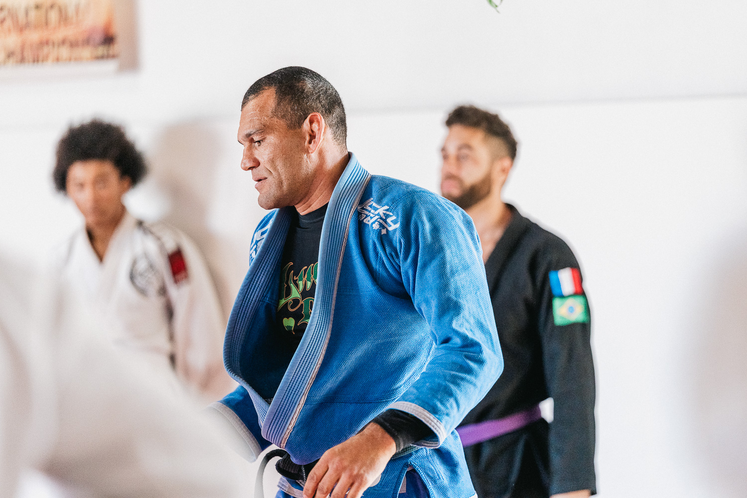Students practicing BJJ techniques